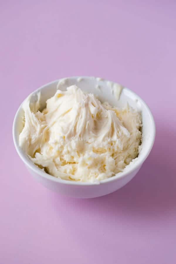 Gluten-Free Vanilla Buttercream Frosting in a white bowl.