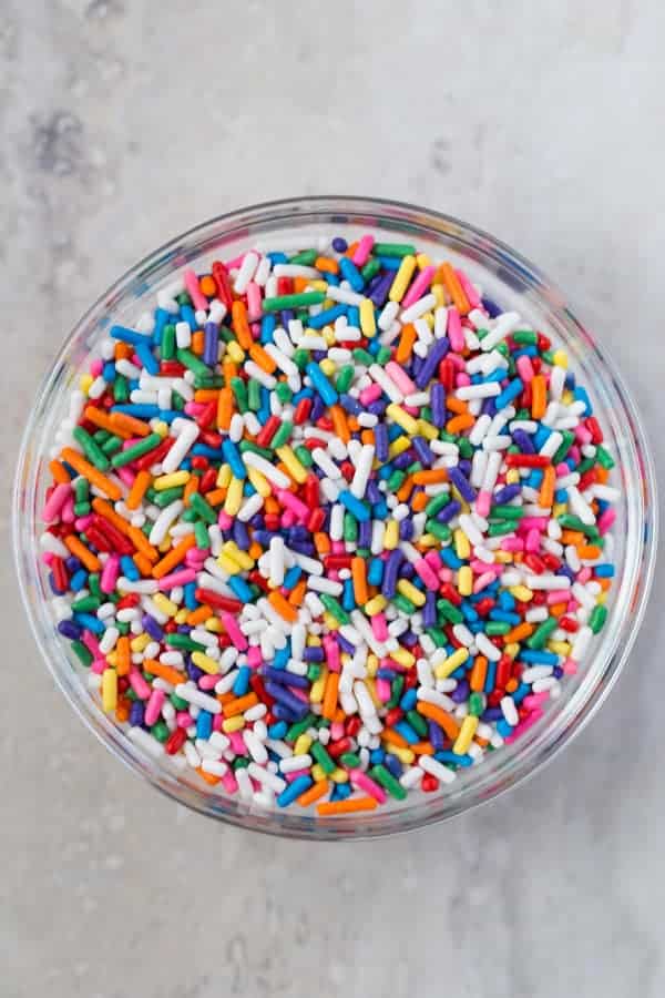 Bowl of rainbow sprinkles.
