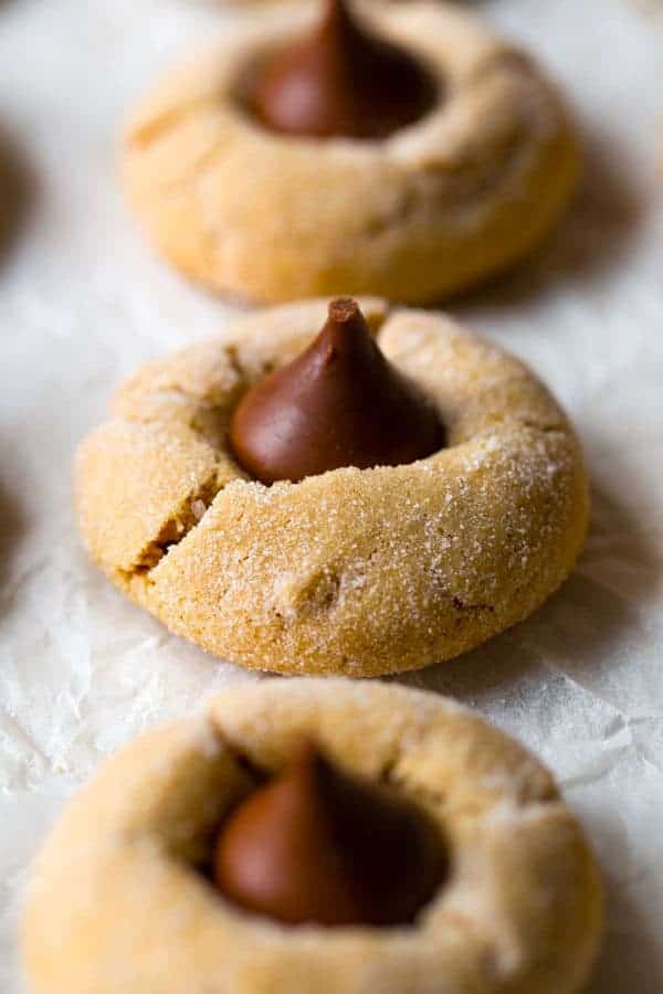 Gluten-free peanut butter blossom cookie topped with a Hershey's kiss.