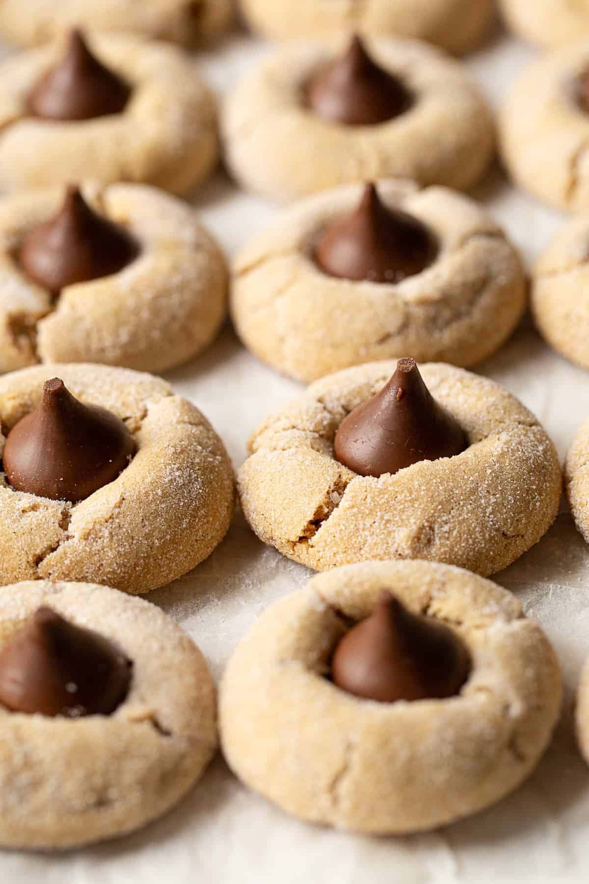 Gluten-free peanut butter blossom cookies cooling.
