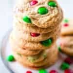 Gluten-free M&Ms cookies with red and green M&Ms on a plate.