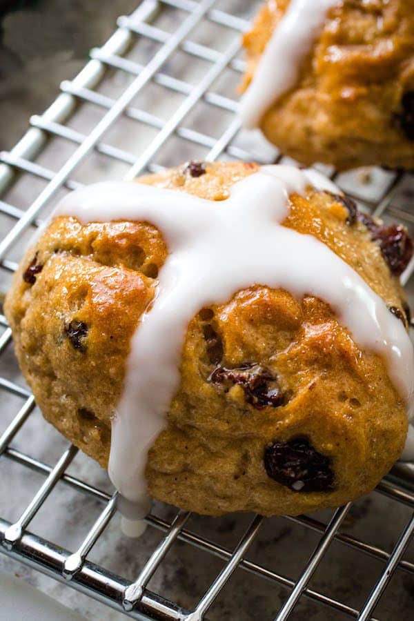 Baked Gluten-Free Hot Cross Bun with White Icing Cross on Cooling Rack
