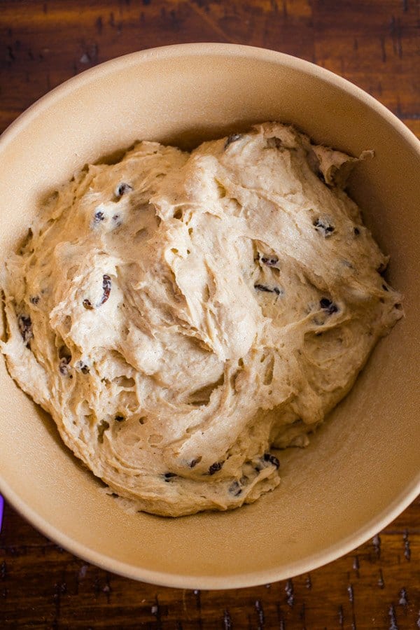 Dough for Gluten-Free Hot Cross Buns Rising in a Brown Bowl