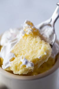 Gluten-free mug cake on a spoon.