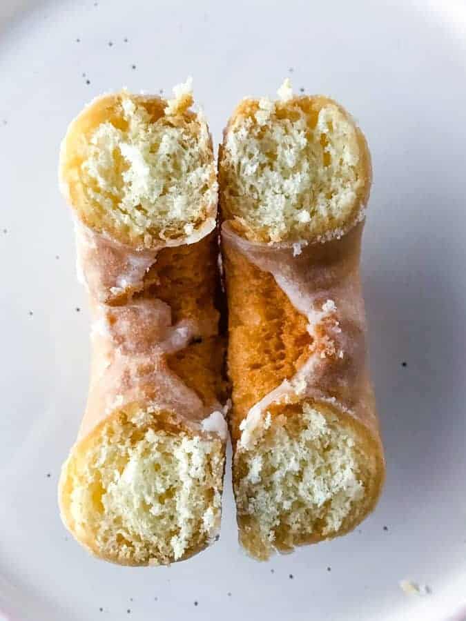 Aldi Gluten-Free Glazed Doughnut Cut in Half on Plate