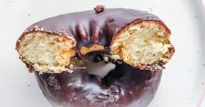 Aldi Gluten Free Chocolate Frosted Doughnut Cut in Half