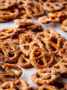 Small pretzel twists coated with cinnamon and sugar.