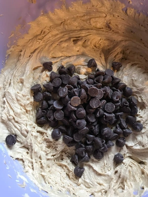 Gluten-free peanut butter banana bread batter with chocolate chips on top.
