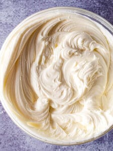 Cream cheese frosting in a bowl.