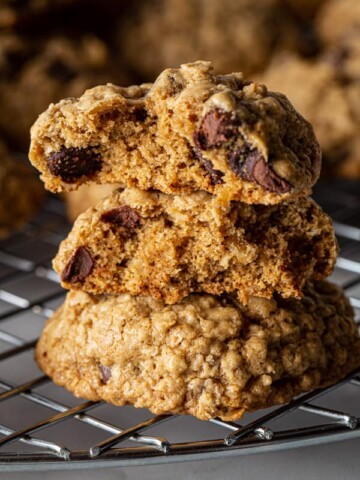Stack of baked gluten-free oatmeal cookies with chocolate chips.