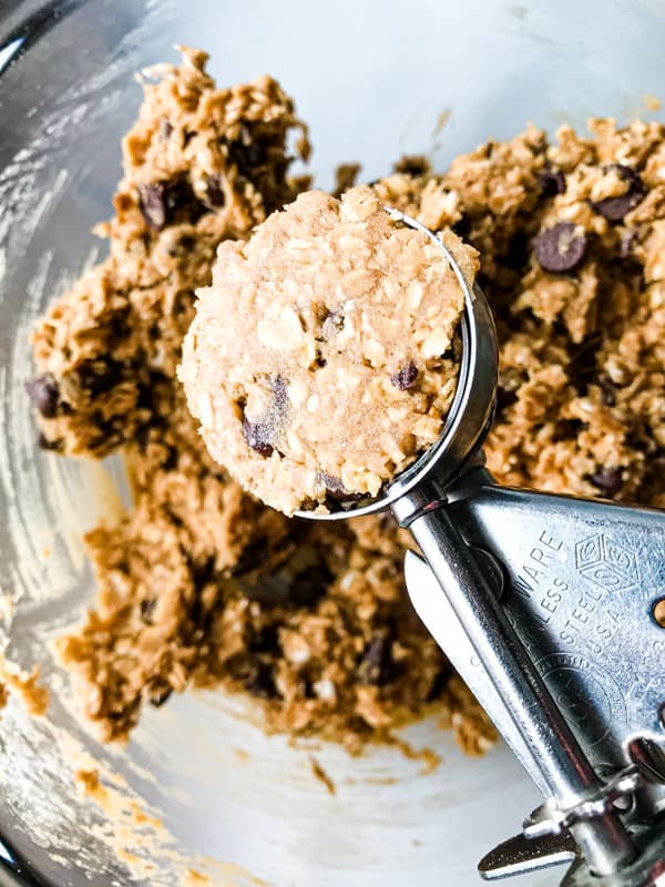 Cookie scoop with gluten-free oatmeal dough.