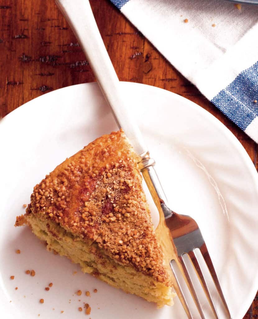 Slice of almond flour coffee cake on plate.