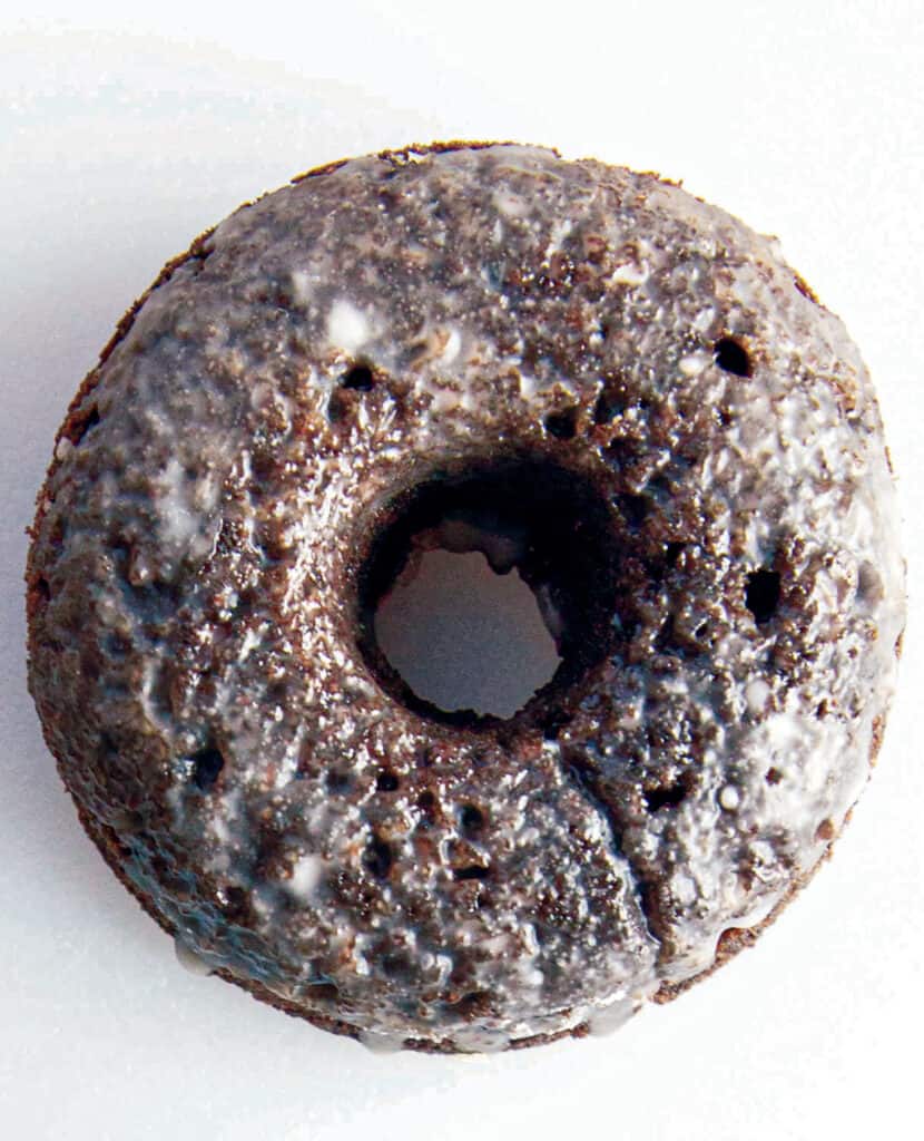 One glazed grain-free chocolate doughnut.