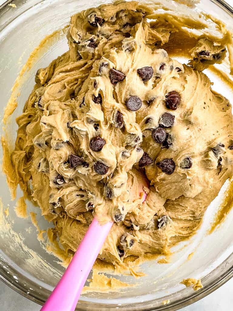 Gluten-free chocolate chip cookie dough in a bowl.