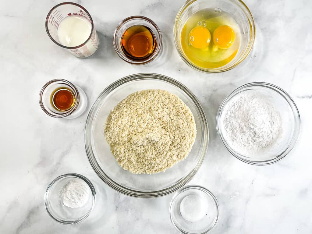 Almond flour pancake ingredients in glass bowls.