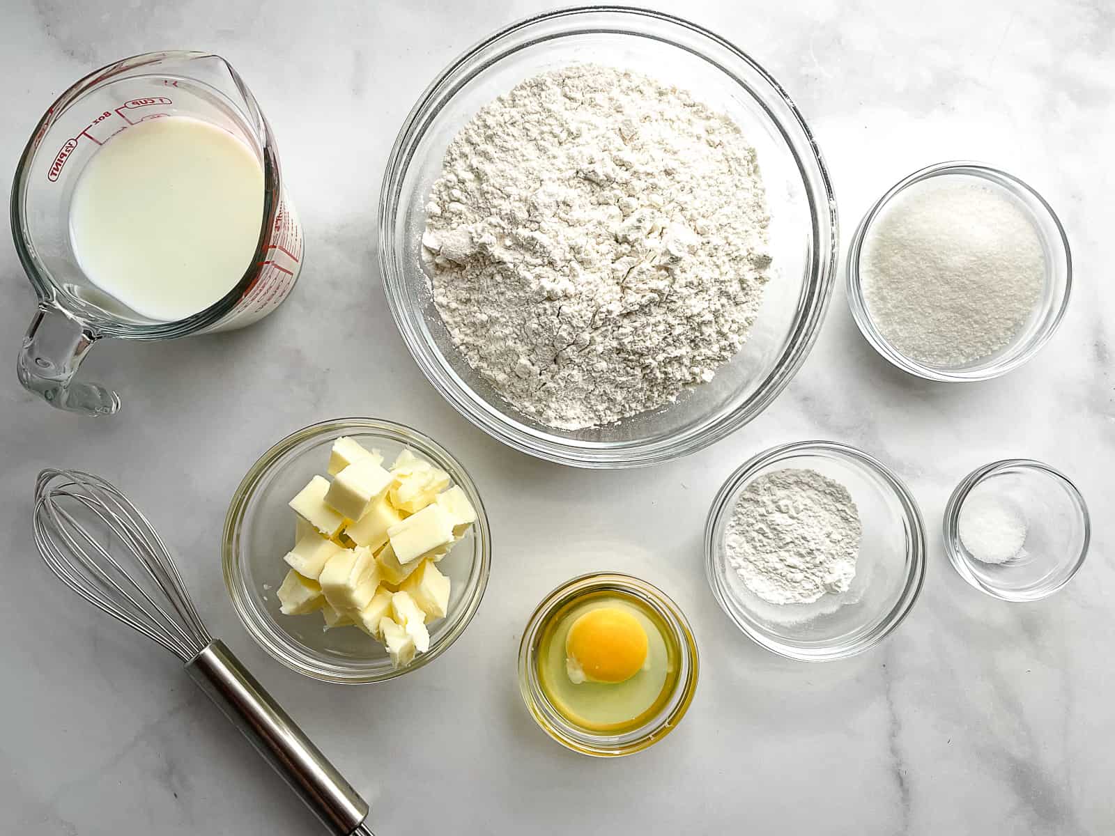 Ingredients for gluten-free scones in individual bowls.