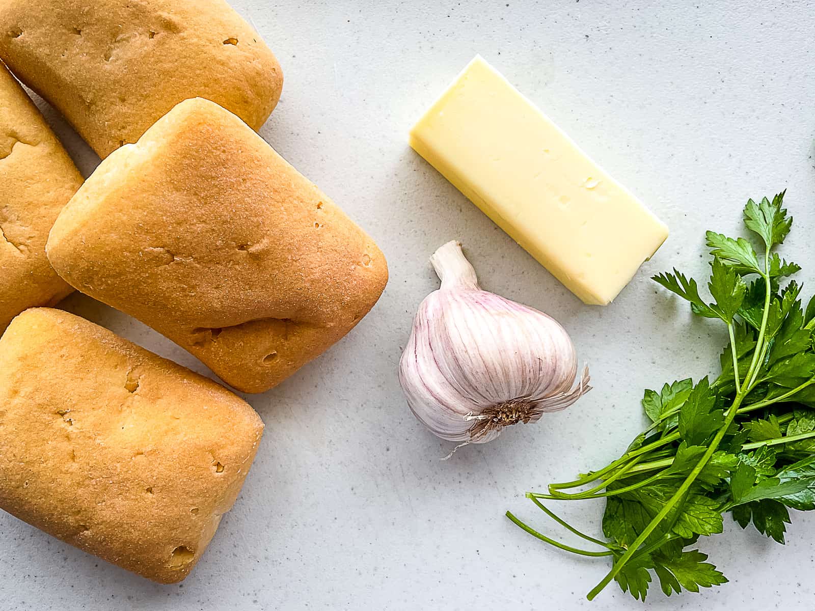 Ingredients for gluten-free garlic bread.