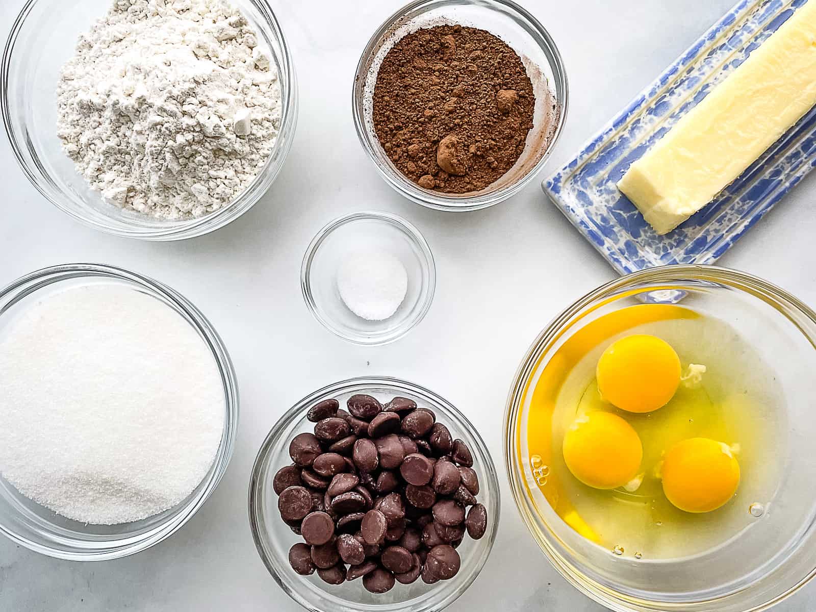 Ingredients for gluten-free brownies in bowls.