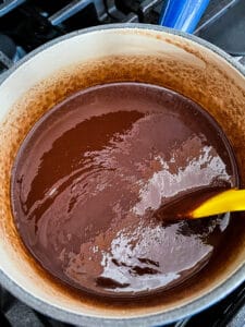 Melted chocolate for gluten-free brownies.