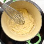 Gluten-free roux, a butter and flour mixture, being whisked for gluten-free gravy.
