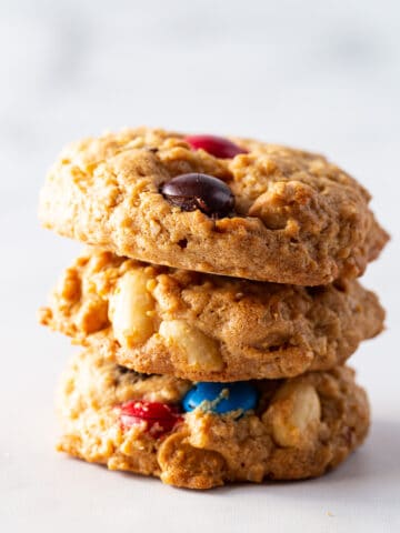 A stack of three gluten-free monster cookies.
