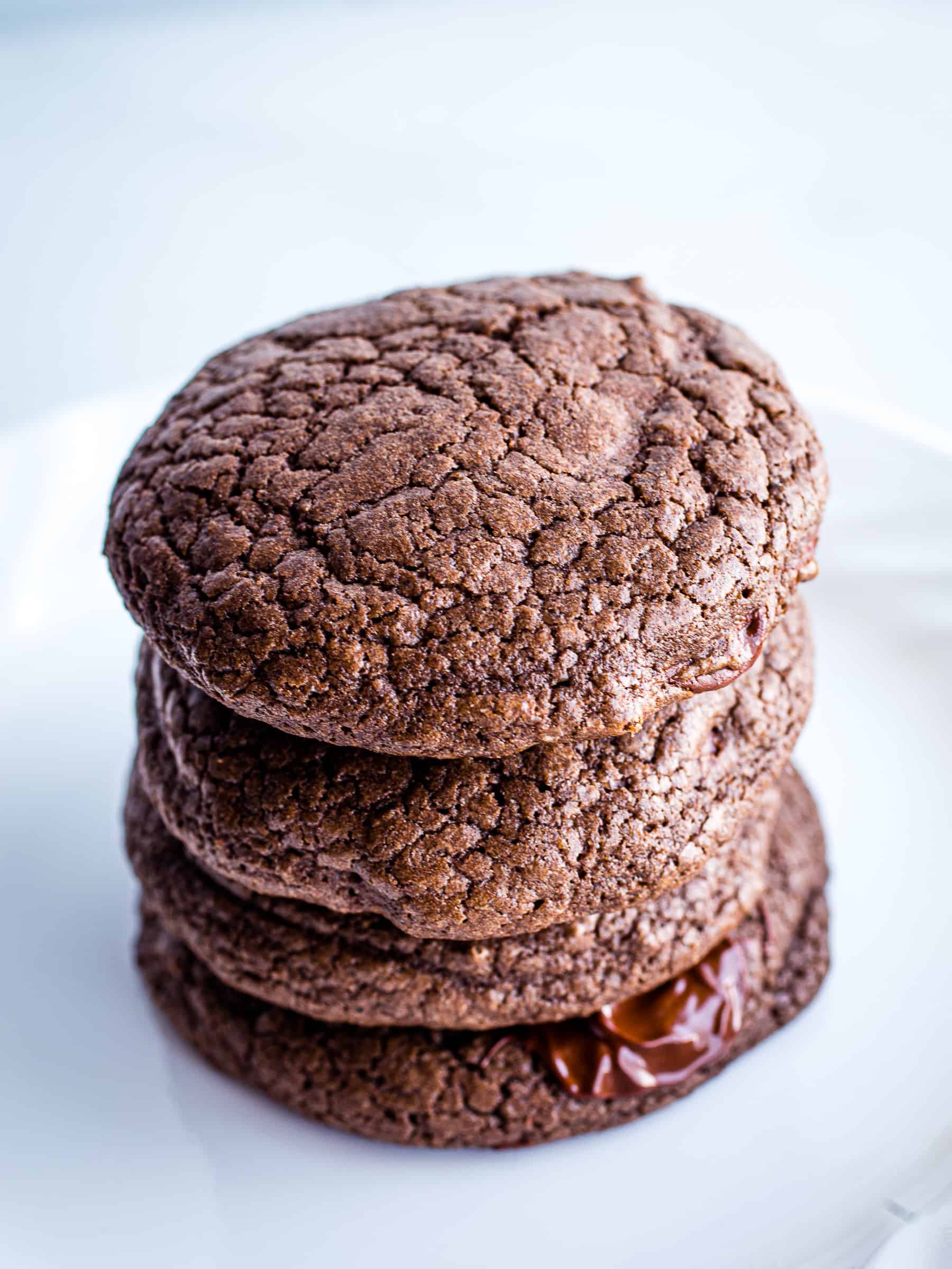 Stack of four gluten-free chocolate cookies.