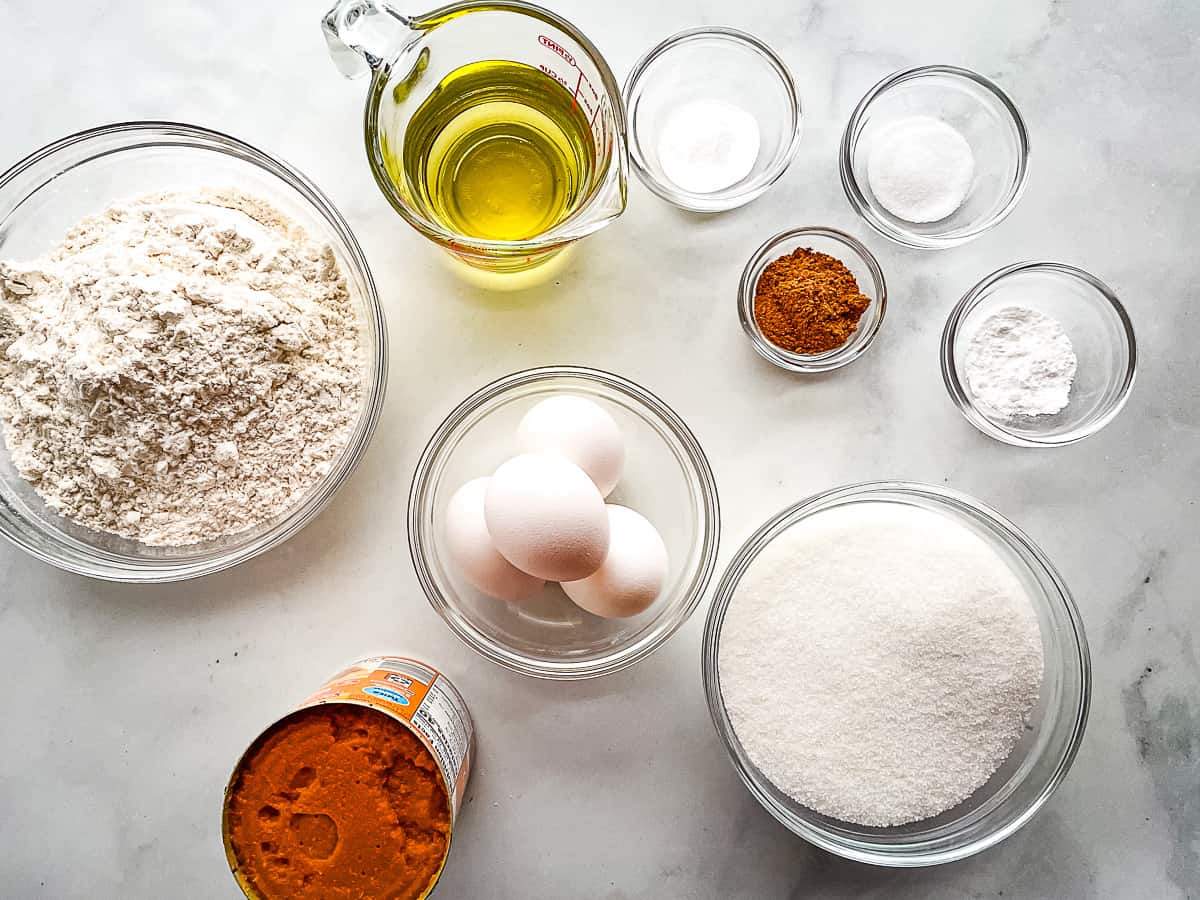 Gluten-free pumpkin bread ingredients measured and on a counter.