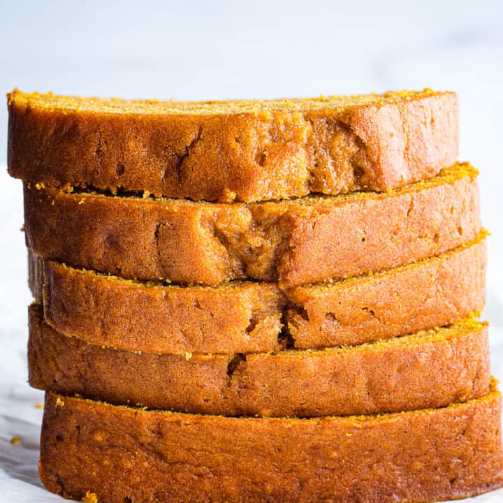 Slices of gluten-free pumpkin bread in a stack.