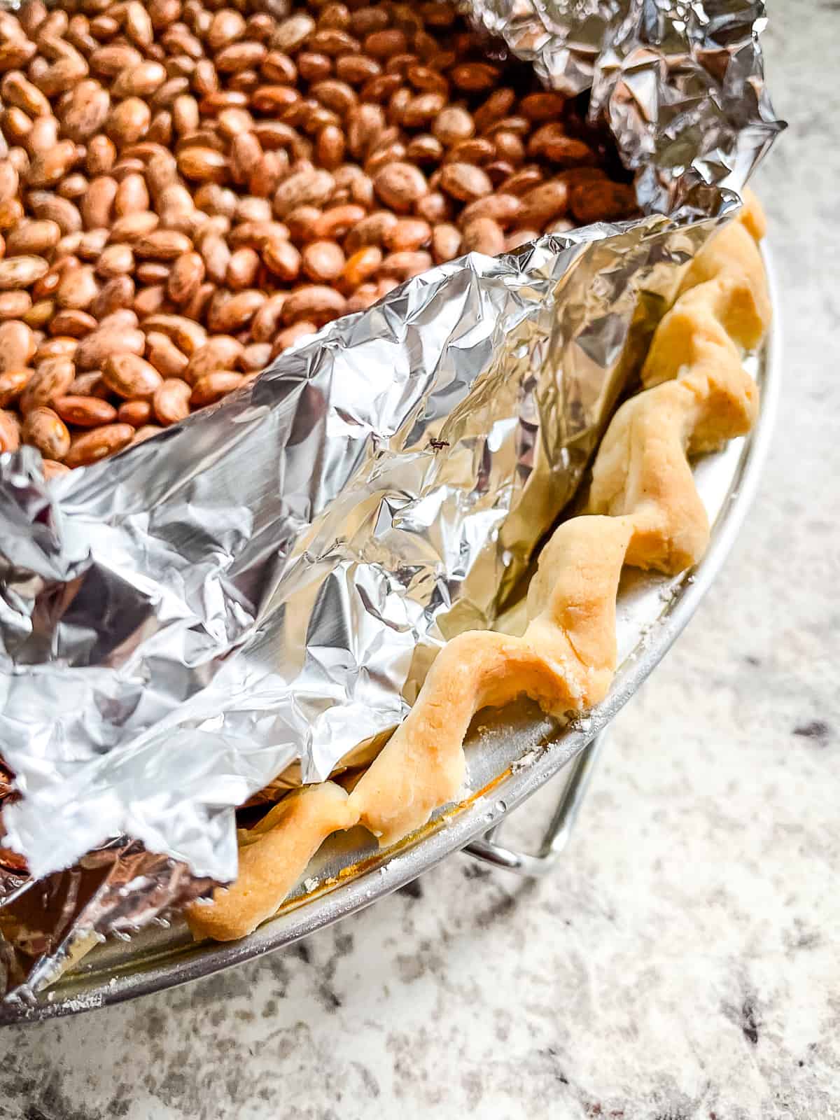 Blind baked gluten-free crust with pinto beans