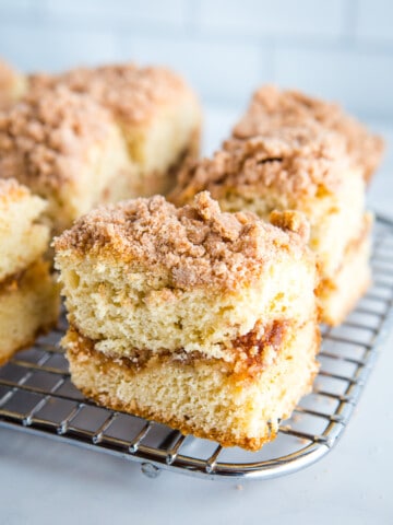 Gluten-free coffee cake slices on a wire cooling rack.