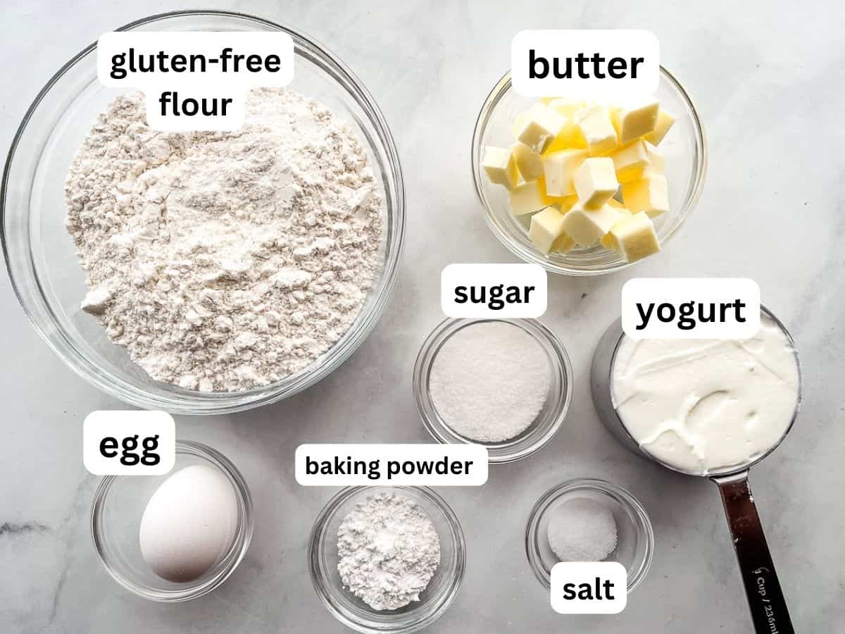 Gluten-free biscuit recipe ingredients on a counter. The ingredients are labeled on the image.