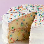 Gluten-free confetti cake on a cake plate.