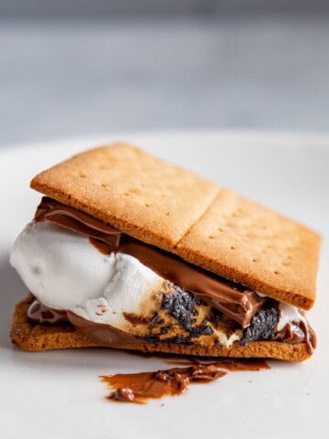 A s'more on the counter made with two gluten-free graham crackers.