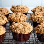 Gluten-free apple muffins on a cooling rack.