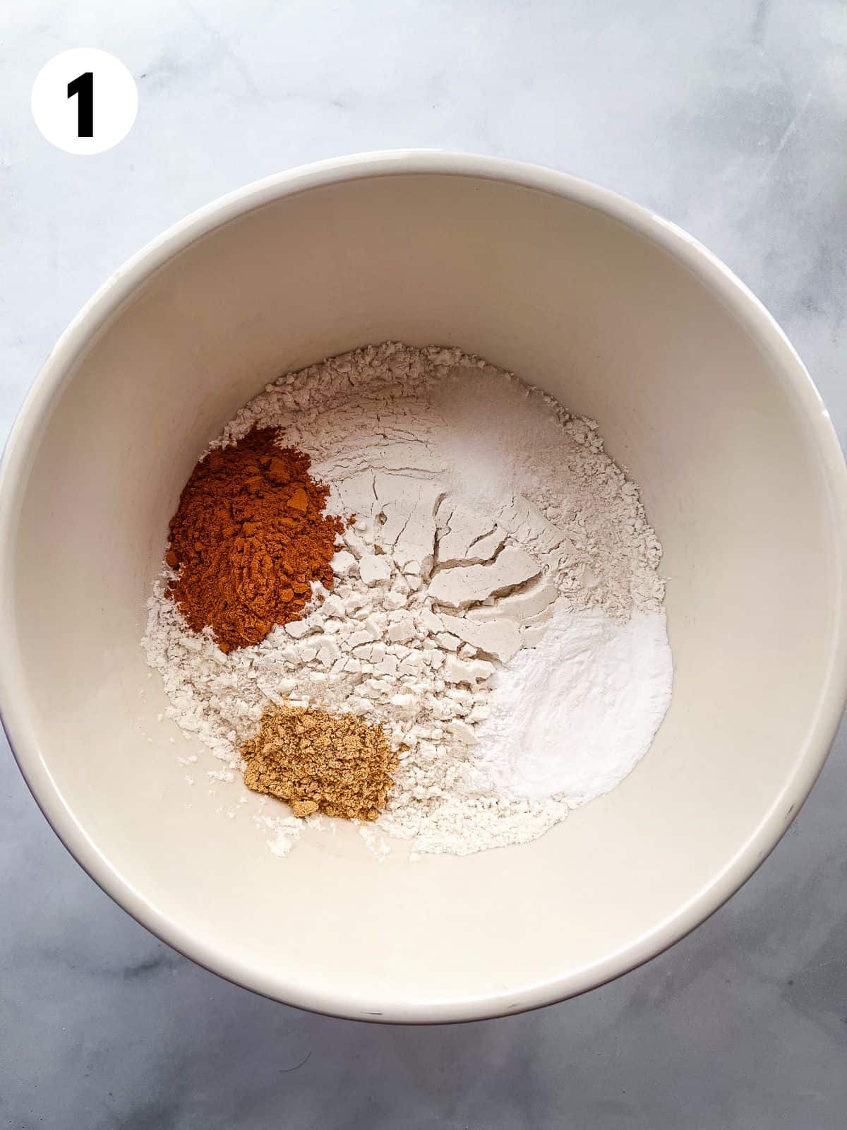 1. Gluten-free flour, baking powder, cinnamon, ginger, and salt in a mixing bowl.