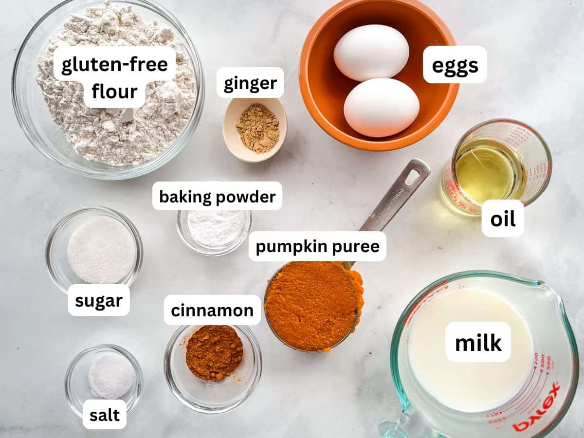 Ingredients for gluten-free pumpkin pancakes in bowls.