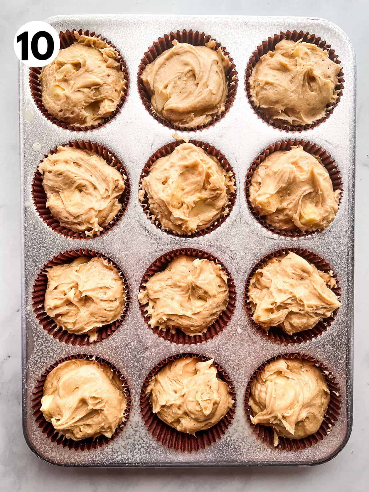 Gluten-free apple muffin batter in the pan.