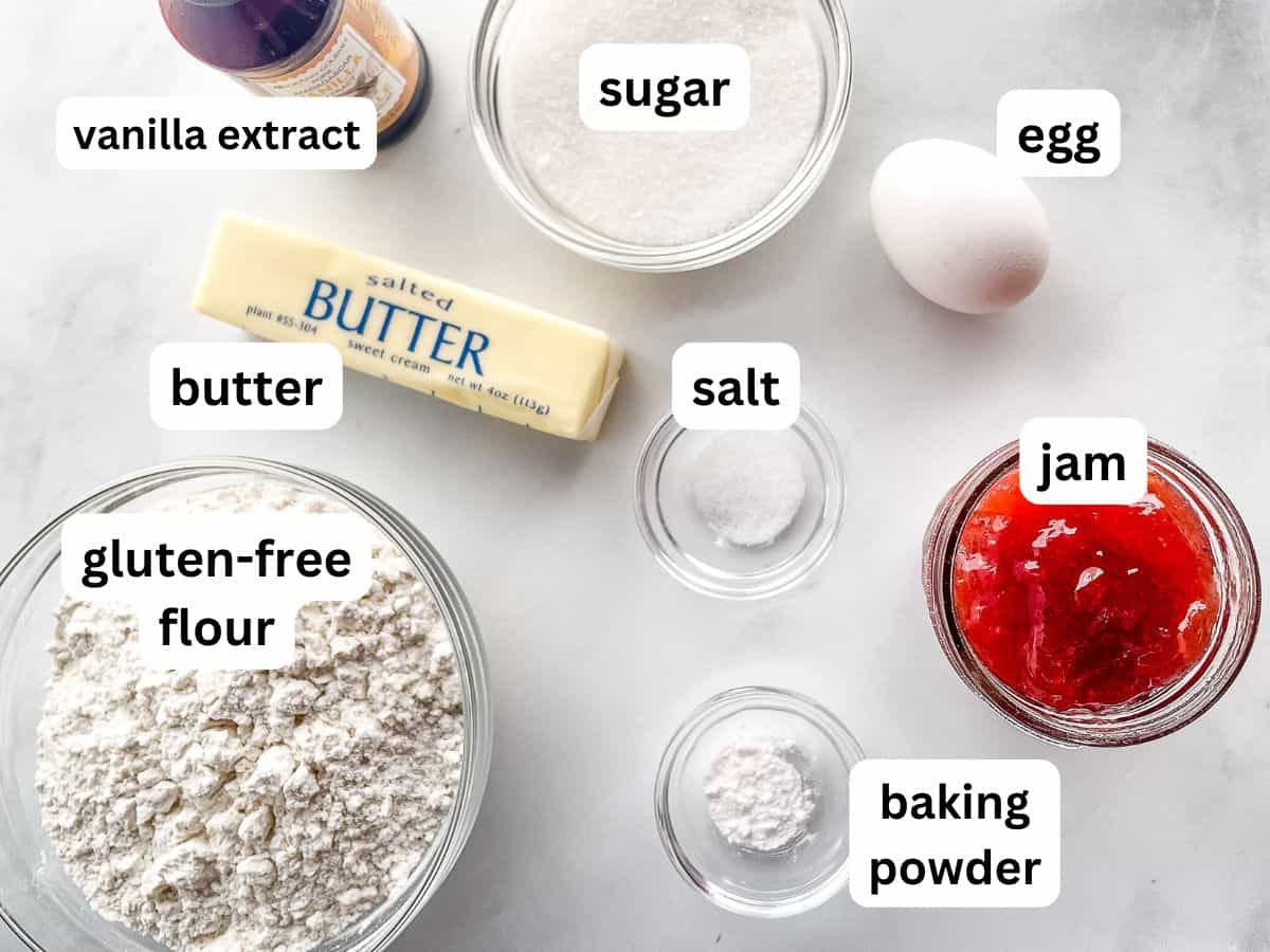 Ingredients for gluten-free jam thumbprints measured on the counter.